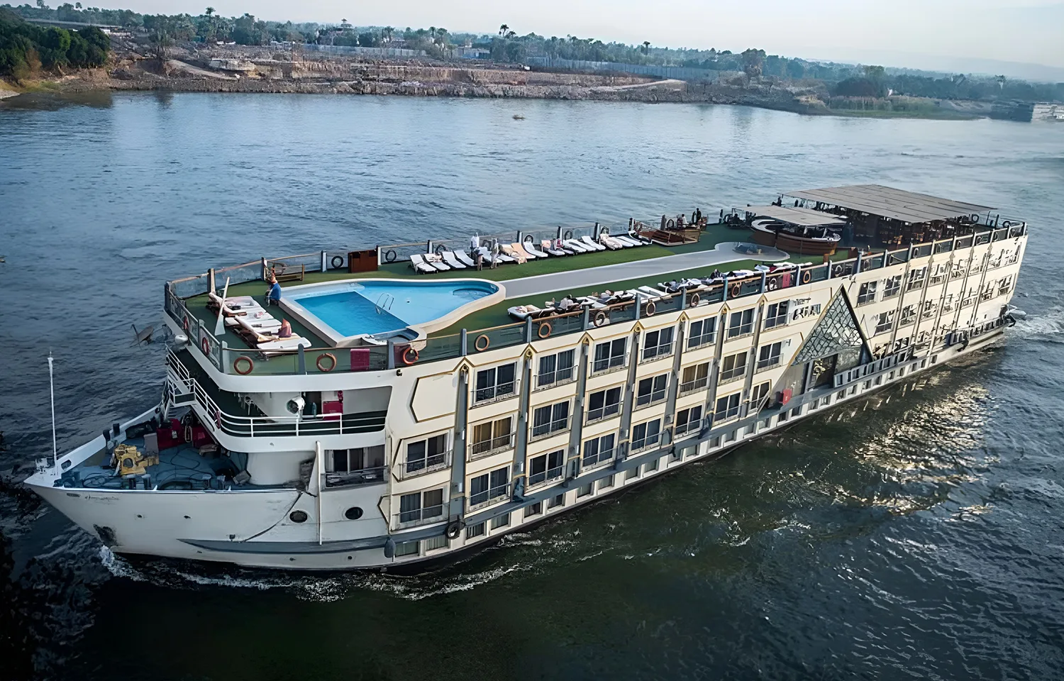 Sun Deck, Showing A Swimming Pool And Lounge Chairs. These Nile Cruise Facilities Are Perfect For Relaxing After A Morning Of Temple Visits.